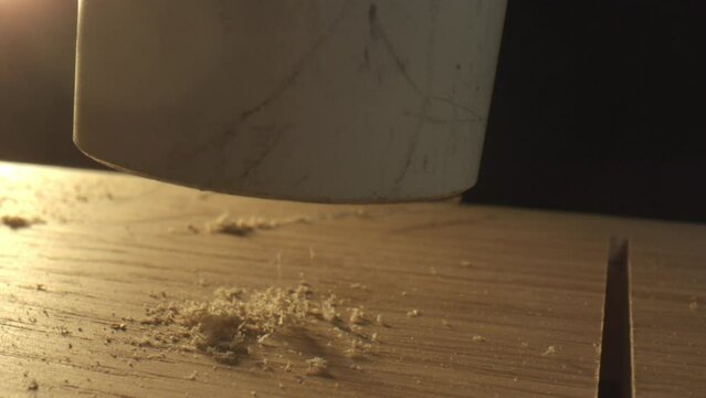 wood dust getting sucked in by a vacuum cleaner
