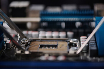 Extreme closeup of CPU installed inside of disassembled computer, copy space