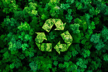 Green recycling symbol overlapping a lush forest canopy to represent environmental sustainability - obrazy, fototapety, plakaty