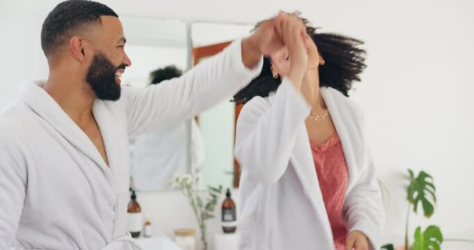 Happy couple, dancing and bonding in bathroom for fun morning, routine or support in love together at home. Man and woman with smile enjoying day or grooming for hygiene or getting ready at house