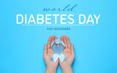 World Diabetes Day. Woman holding light blue ribbon on color background, top view. Banner design