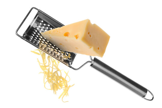 Grating cheese with hand grater in air on white background
