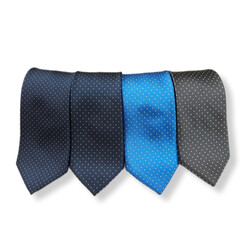 Ties in different colors with polka dot pattern on a white background