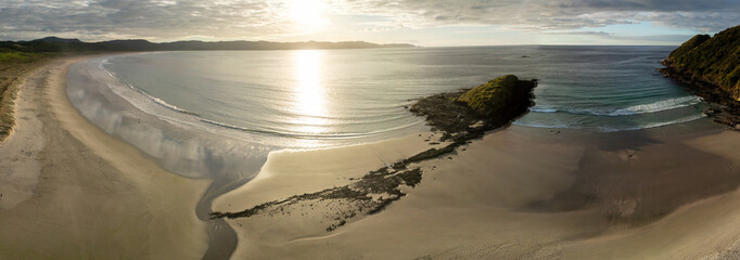Aerial of Spirits Bay beach at sunset, Northland, New Zealand.