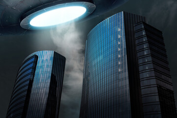 Alien spaceship emitting light over buildings. UFO, extraterrestrial visitors