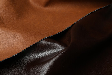 Different leather samples as background, closeup view