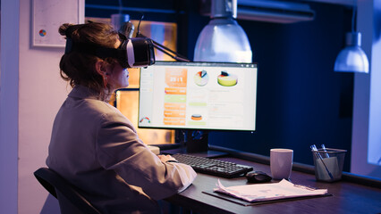 Corporate advisor planning report with vr glasses at desk, working with virtual reality 3d...
