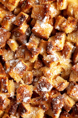 Homemade Bread Pudding in a Dish, top view. Flat lay, overhead, from above. Close-up.
