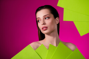 Photo of chic attractive girl cover body with green vivid banners booklet for opening new spa salon