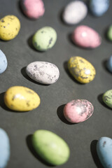 Eggs set. Many food protein. Colorful bright on black background. Hard shadow. Easter sun pattern. Color decorative paint art. Traditional cuisine top view. Flatlay