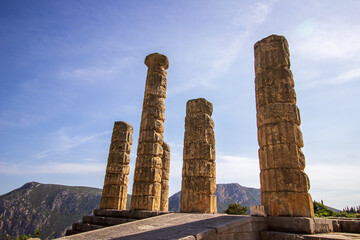 Ruined columns of Delphi. Archaeological site in Greece. Greek religious sanctuaries to the god Apollo. UNESCO World Heritage. View of ancient Delphi columns.