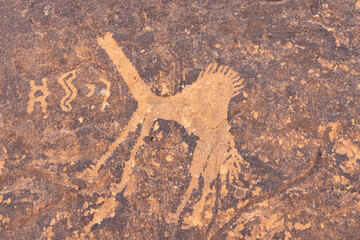 Ancient petroglyph of a camel at the Jubbah rock art site at Ob Sinman Mountain.