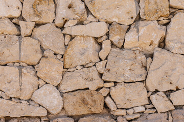 Detail of a dry stone masonary wall.