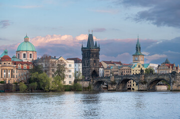 Prague, Czech Republic skyline with historic Charles Bridge and Vltava river on sunny day.
- 730459177