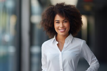 Confident, stylish and attractive young Afro-Black woman exudes happiness professionalism in a stock photo, dressed in business casual attire suitable for the office. Generative AI.