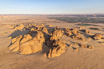 Fototapeta na wymiar Rock formations in the Saudi Arabian desert, seen from a hot air balloon.