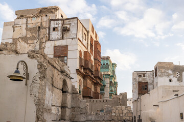 Traditional Hijazi tower house with wooden Rosan windows and balconies.