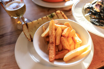 Golden French Fries with Grilled Bread on a Sunny Day