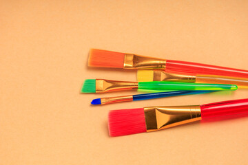 Fototapeta premium Paint brushes. Background with selective focus and copy space