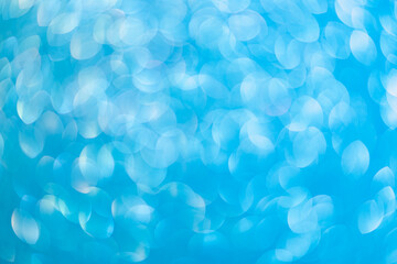 Abstract blurred background. Defocused portrait lens back. Backdrop bokeh. Vivid blue.