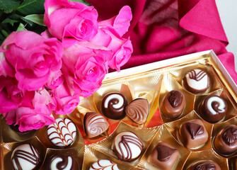 set of chocolates iand red rose. gift concept for woman	