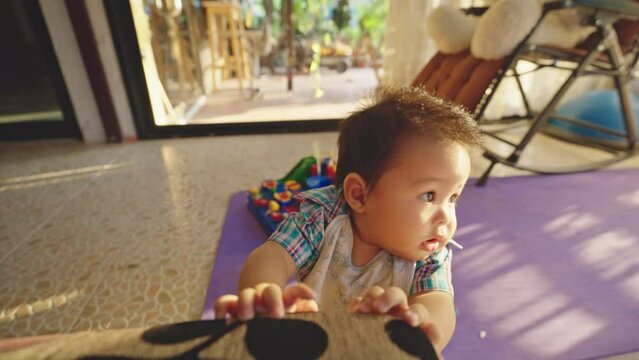 Asian kids are starting to learn how to crawl independently.