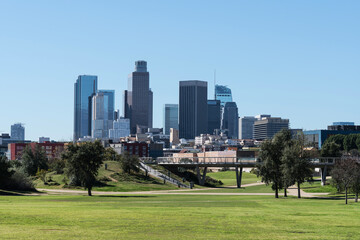 Fototapeta premium Downtown Los Angeles skyline with urban park in foreground. 