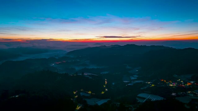 Aerial hyperlapse shot of a tea valley overlooking on the mountain in Cameron Highlands, Malaysia during beautiful sunrise. 