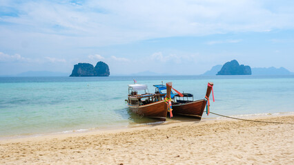Longtail boats on the beach of Koh Ngai island tropical Island in the Andaman Sea Trang in Thailand