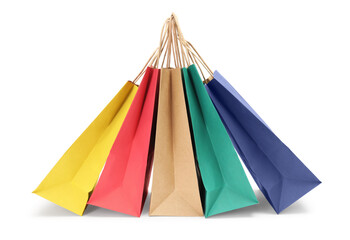 Colorful and kraft paper shopping bags isolated on white