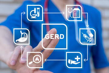 Doctor using virtual touch screen presses abbreviation: GERD. Gastroesophageal Reflux Disease ( GERD ) or acid reflux symptoms medical concept. Gastrointestinal system disease and digestive problems.