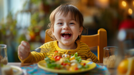 Positive child photo of a little kid eating and smiling