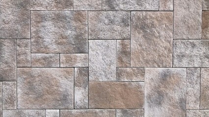 Exterior tiles in a mixture of white, dark gray and brown