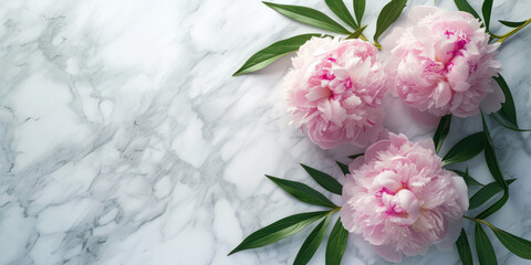 Top view flowers decoration on a marble background, Flat lay Minimal fashion summer holiday concept