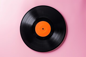 Retro pattern music concept with old black vinyl record on pastel pink background