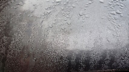 Water droplets clinging around the car