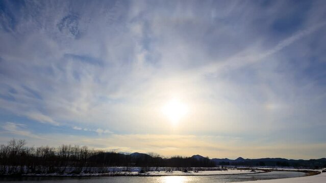 沈む夕日　タイムラプス　冬　雪景色
