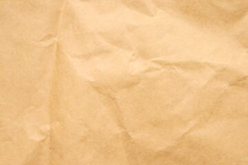 Abstract crumpled and creased recycle brown paper texture background