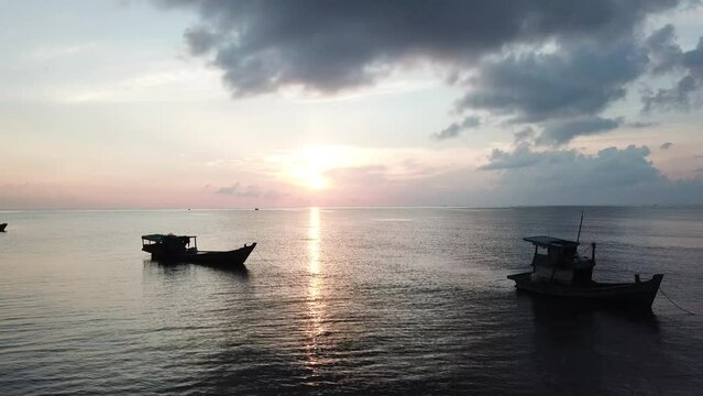 Boats at sea in the early morning