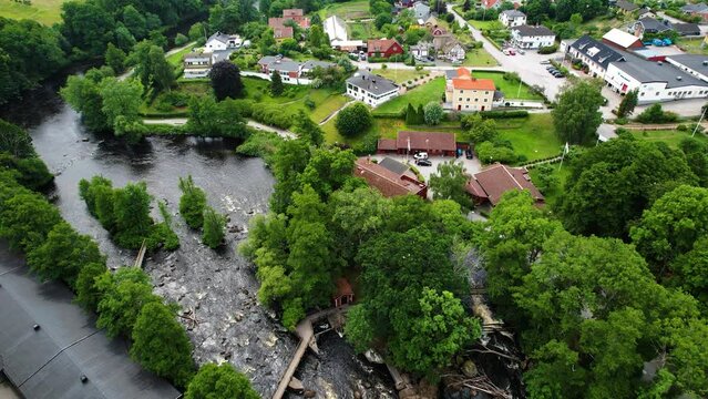 Fishing Store And Laxens hus Museum By Morrumsan River In Morrum, Blekinge, Sweden. - aerial shot