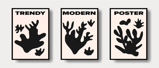 Set of posters with black silhouettes of flowers, plants and leaves on a beige background.