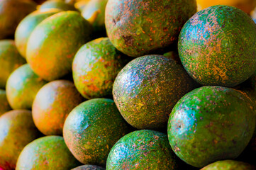 Fototapeta na wymiar Fresh avocados on a fruit stand at Chiang Mai Province
