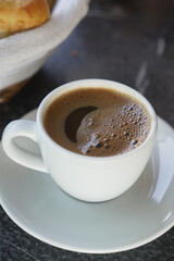 a cup of turkish coffee on table 