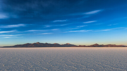 Salt Dessert/Flats with mountains in Salar De Uyuni 