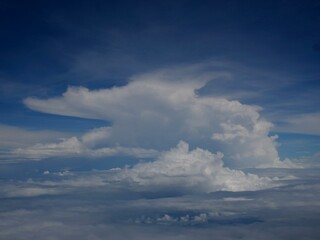 Fototapeta na wymiar Cumulus nimbus over the equator view from aircraft on descend into Singapore