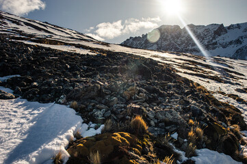 Snowy mountain with protruding rocks. Andes mountains. Ushuaia