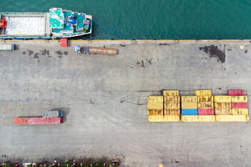 Loading a ship with containers at the port. Sea cargo transportation. Cargo