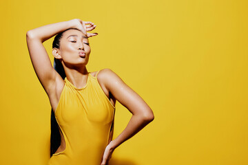 Swimsuit woman yellow trendy closeup fashion smile surprised amazed summer beauty portrait