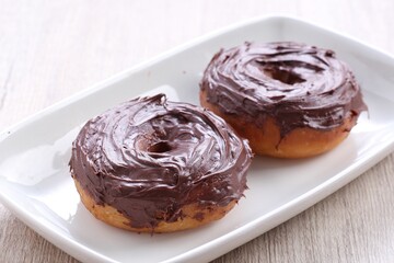 Food photography is a still life photography genre used to create attractive still life photographs of food. As a specialization of commercial photography,