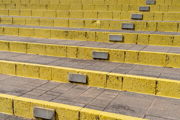 Yellow painted steps in urban area